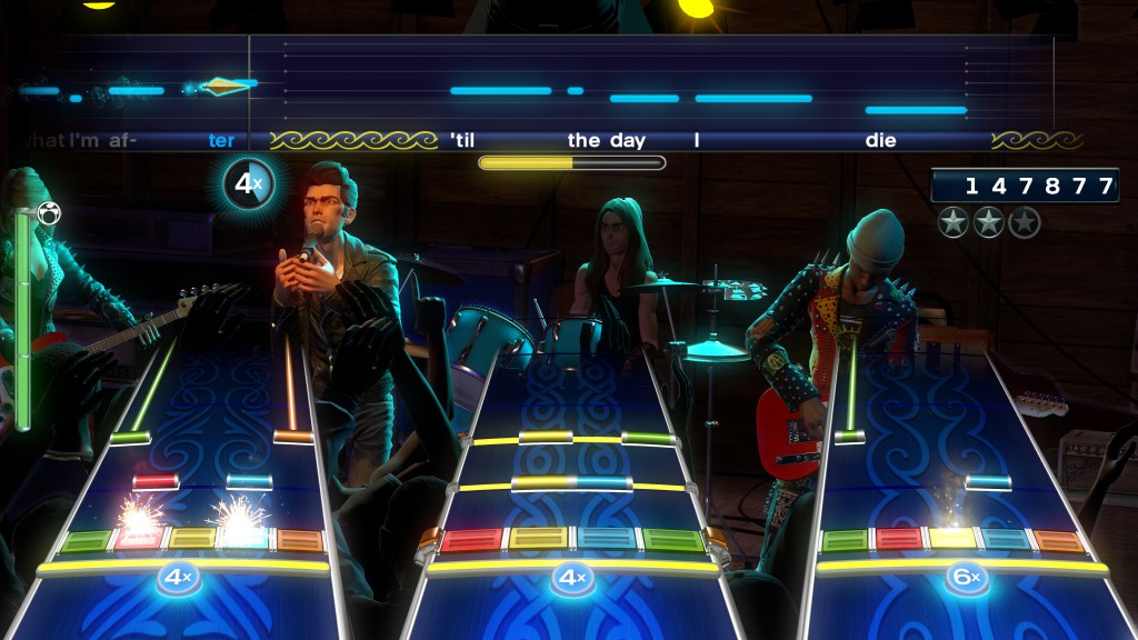 3 musicos et un chanteur, pas de doute Rock Band est bien un party game ! Dommage qu'on ne puisse pas acheter les guitares à part...